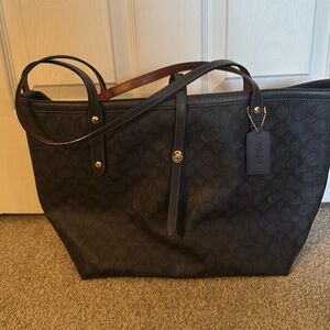 Gently used Coach tote with dust bag.